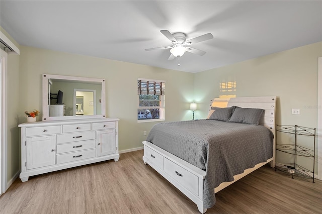 bedroom featuring light wood-type flooring and ceiling fan