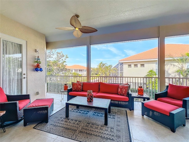 sunroom / solarium with ceiling fan