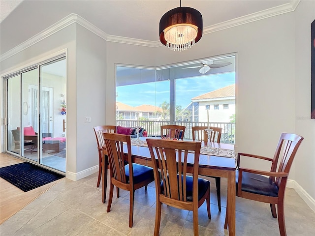 dining area with crown molding and light tile patterned floors