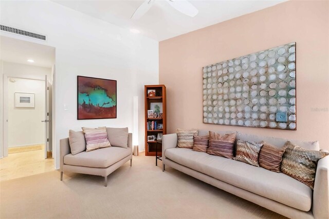 living area featuring ceiling fan, carpet, visible vents, and recessed lighting