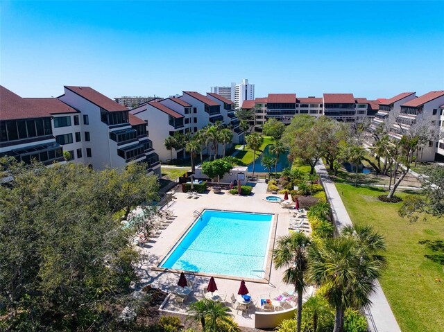 community pool with a patio