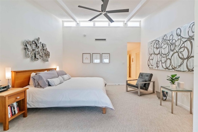 bedroom featuring carpet floors, a towering ceiling, visible vents, baseboards, and beamed ceiling