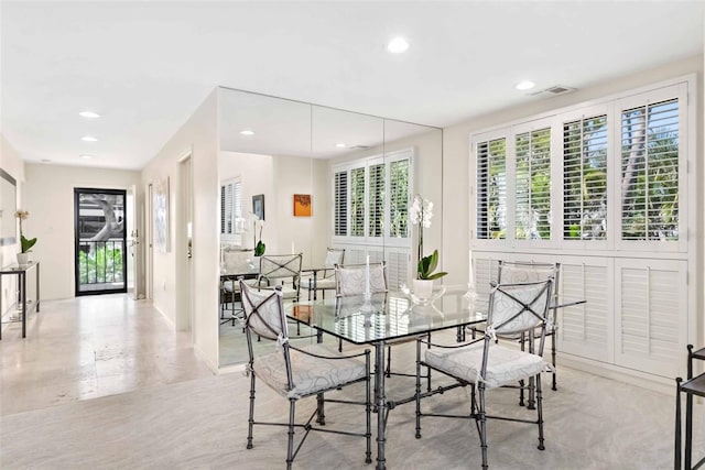 dining area with recessed lighting and visible vents