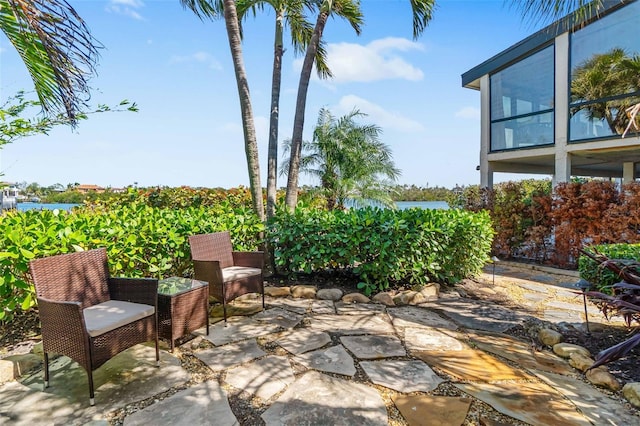 view of patio / terrace with a water view