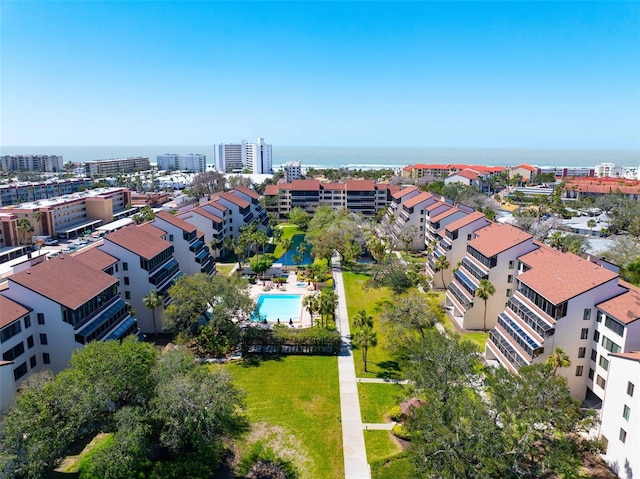 birds eye view of property featuring a city view