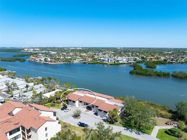 bird's eye view featuring a water view and a residential view