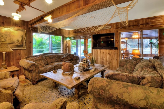 living room with wood walls