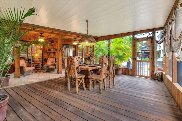 24120 Mink Rd, Astor, FL 32102 - sunroom with a wooden deck, wood-type flooring, and wooden walls