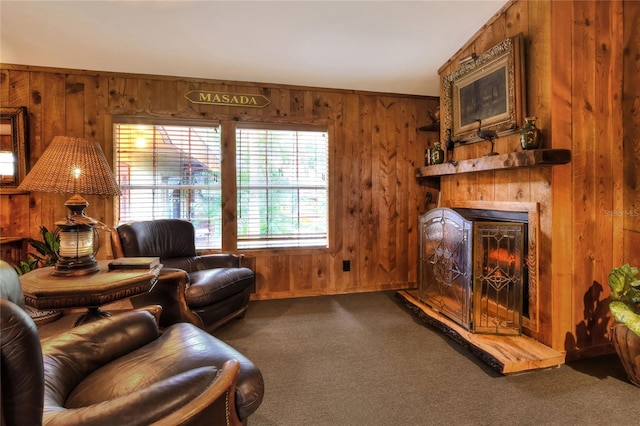 living room with carpet flooring and wooden walls