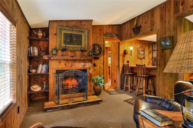 24120 Mink Rd, Astor, FL 32102 - living room with wood walls, carpet, plenty of natural light, and a large fireplace