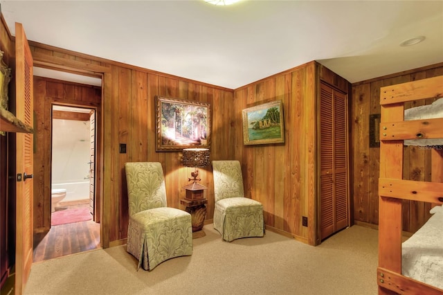 24120 Mink Rd, Astor, FL 32102 - living area featuring wooden walls and carpet floors