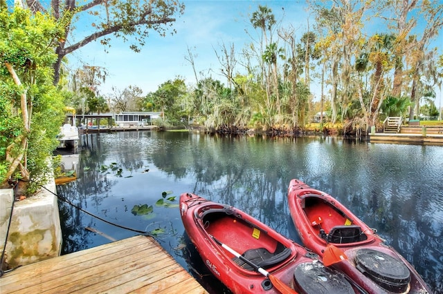 view of dock with a water view