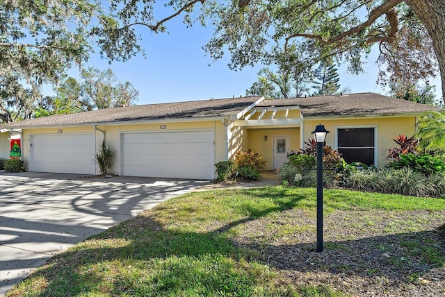 single story home featuring a garage