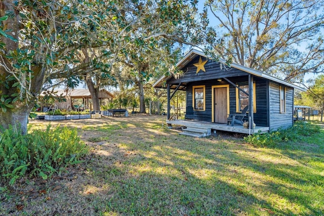 exterior space with a front yard