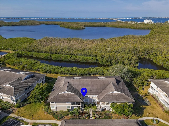 birds eye view of property featuring a water view