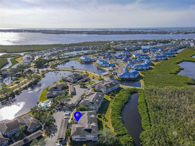 bird's eye view with a water view