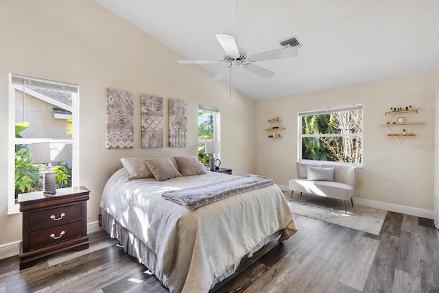 bedroom featuring vaulted ceiling, ceiling fan, and dark wood-type flooring