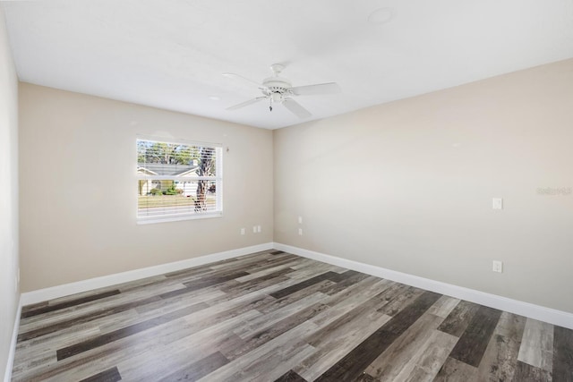 unfurnished room featuring ceiling fan and hardwood / wood-style floors