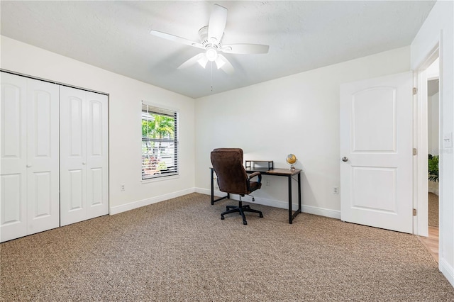 office area with carpet flooring and ceiling fan