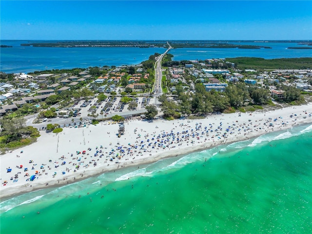 bird's eye view with a view of the beach and a water view