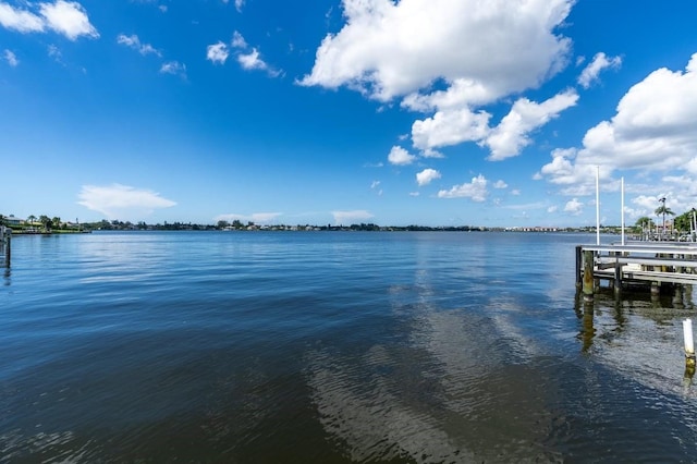 property view of water featuring a boat dock