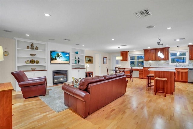 living room featuring light wood-type flooring