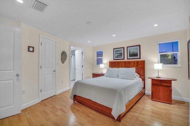 bedroom featuring light hardwood / wood-style floors