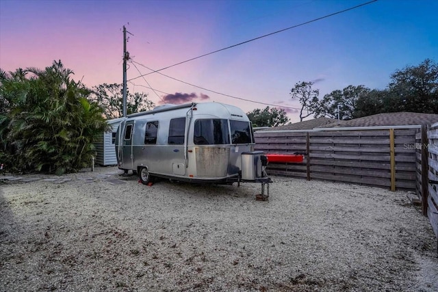 view of yard at dusk