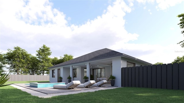 rear view of house featuring a yard, a patio, a fenced in pool, and ceiling fan