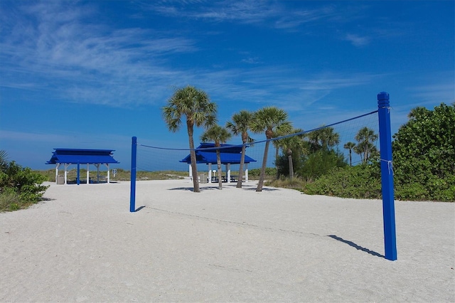 view of home's community featuring volleyball court