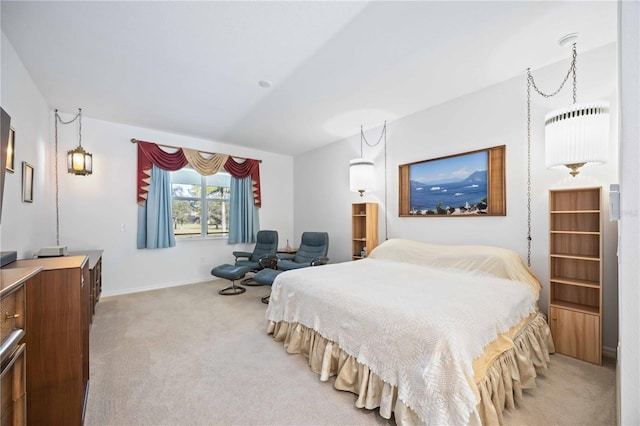 bedroom featuring light carpet