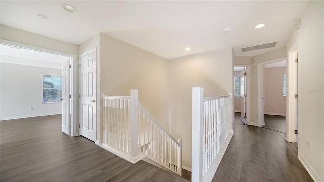 corridor featuring dark hardwood / wood-style flooring