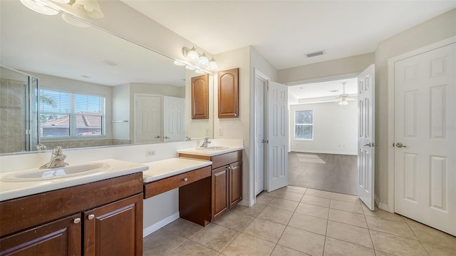 bathroom featuring tile patterned floors, ceiling fan, and vanity