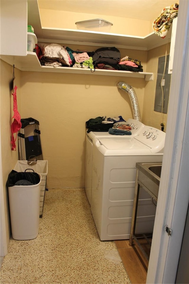 laundry area featuring independent washer and dryer and electric panel