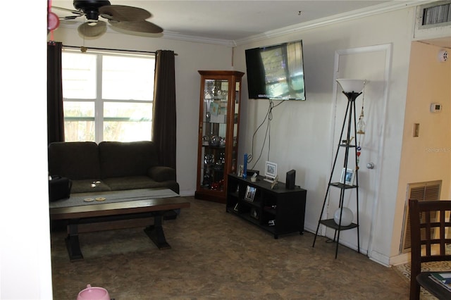 living room featuring ceiling fan and crown molding