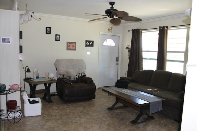 living room featuring ceiling fan and ornamental molding