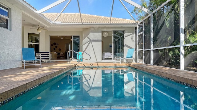 view of pool featuring ceiling fan and a patio area