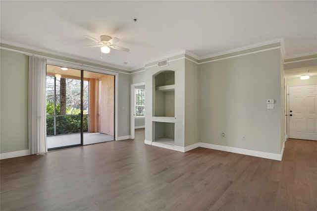 unfurnished living room with built in features, ornamental molding, dark hardwood / wood-style floors, and ceiling fan