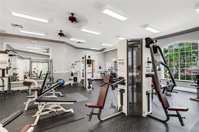 workout area with ornamental molding