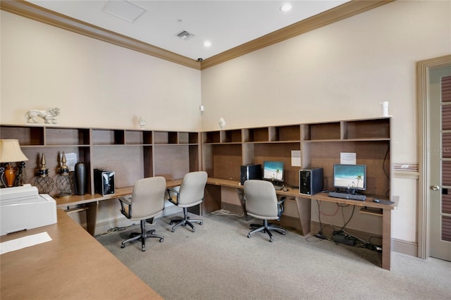 carpeted office space featuring ornamental molding