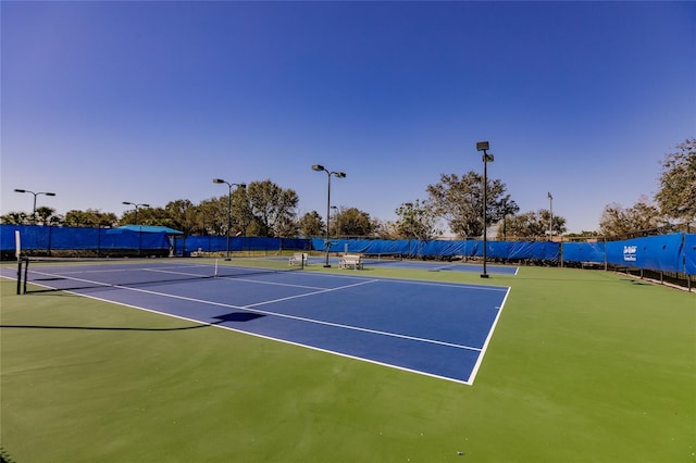 view of tennis court with basketball court