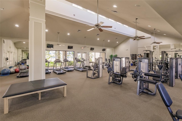 exercise room featuring ceiling fan, ornate columns, and high vaulted ceiling