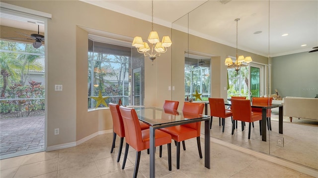 dining area featuring ceiling fan with notable chandelier, ornamental molding, and light tile patterned flooring