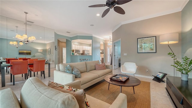 living room with crown molding and ceiling fan with notable chandelier