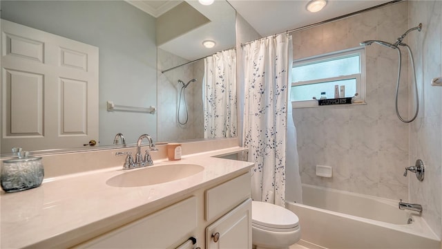 full bathroom with vanity, shower / bath combo, and toilet