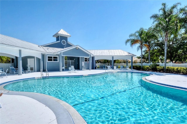 view of swimming pool featuring a patio