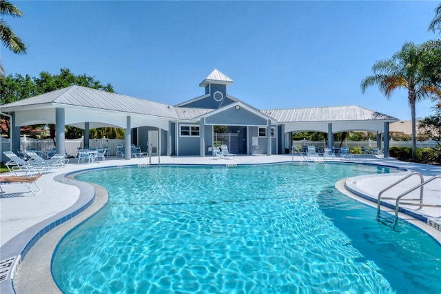 view of swimming pool with a gazebo and a patio area