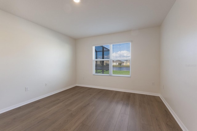 empty room featuring hardwood / wood-style floors