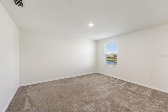 spare room with carpet flooring