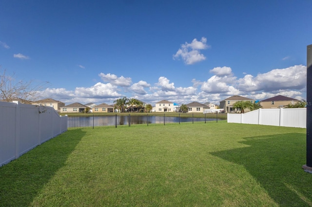 view of yard featuring a water view